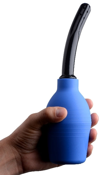 a close up of a person holding a blue bottle 